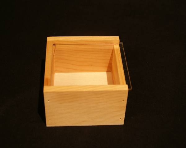 Custom wood box with Plexiglas sliding top.